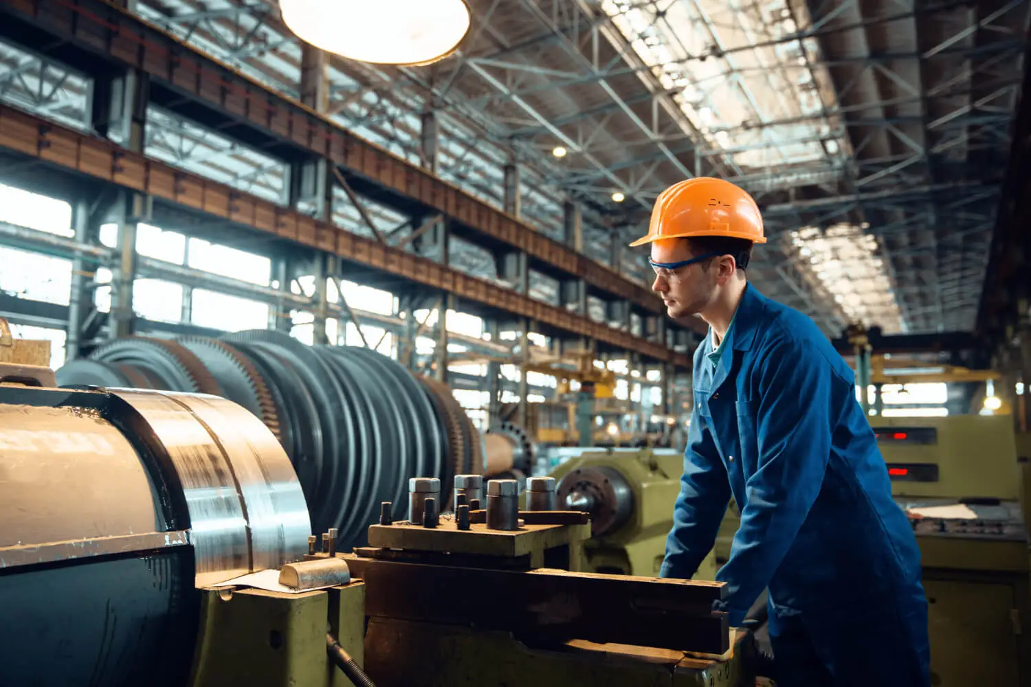 boy doing steel manufacturing