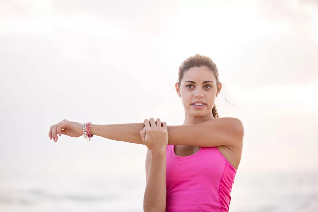 girl exercising in pink