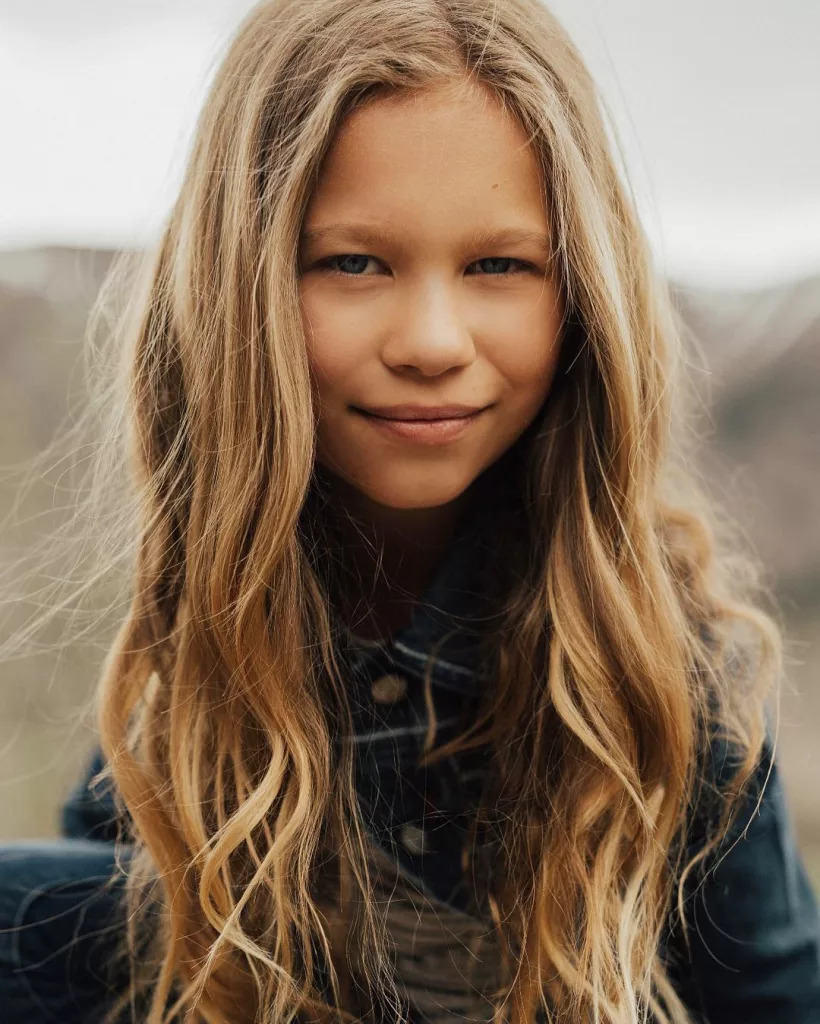 Wesley posing with her hair open.