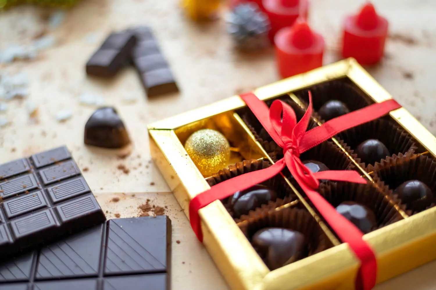 wooden-table-with-goodies-lot-chocolate-decoration-top-view