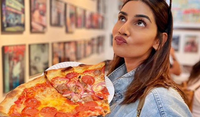 sanjana-eating-pizza