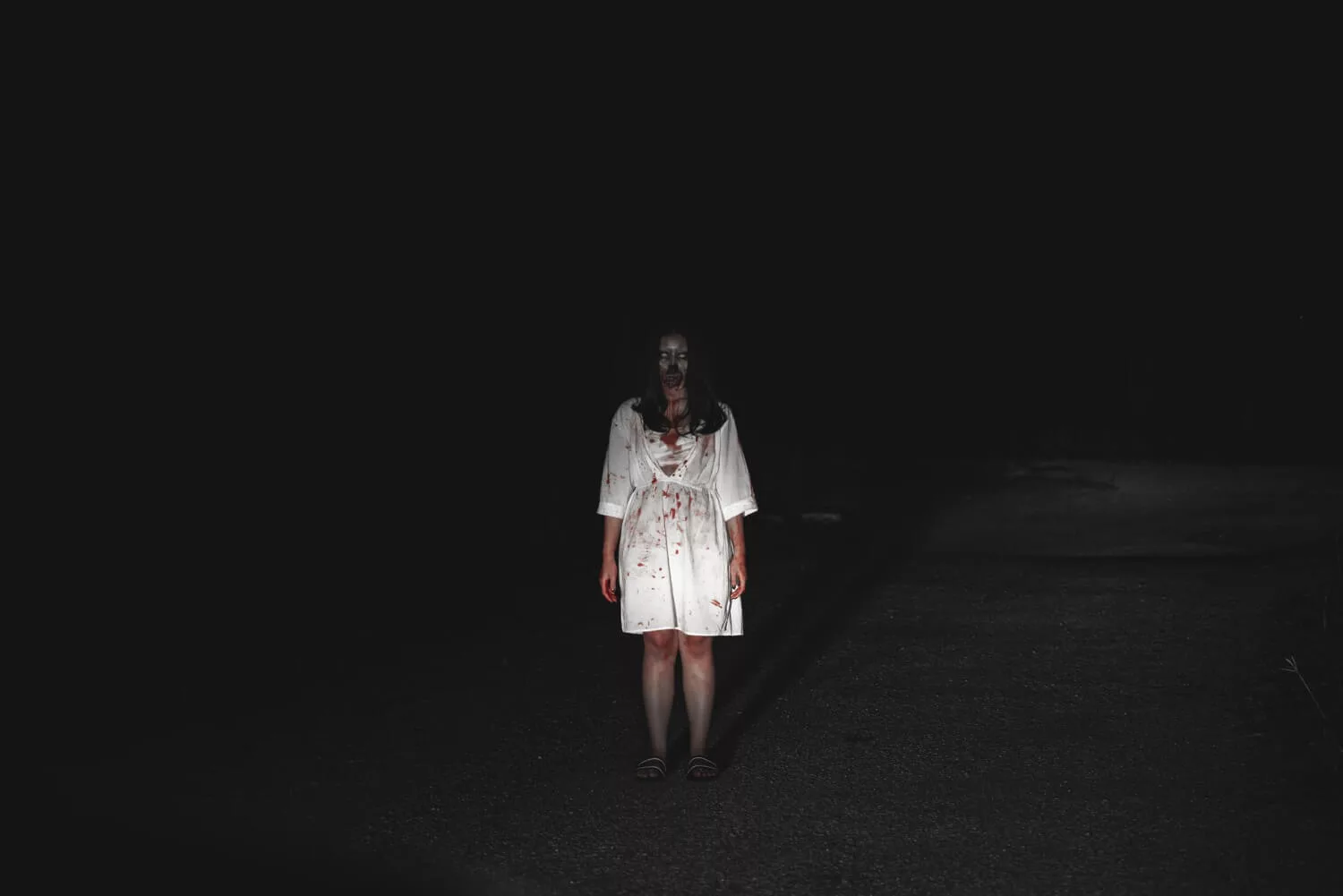 girl haunted on road