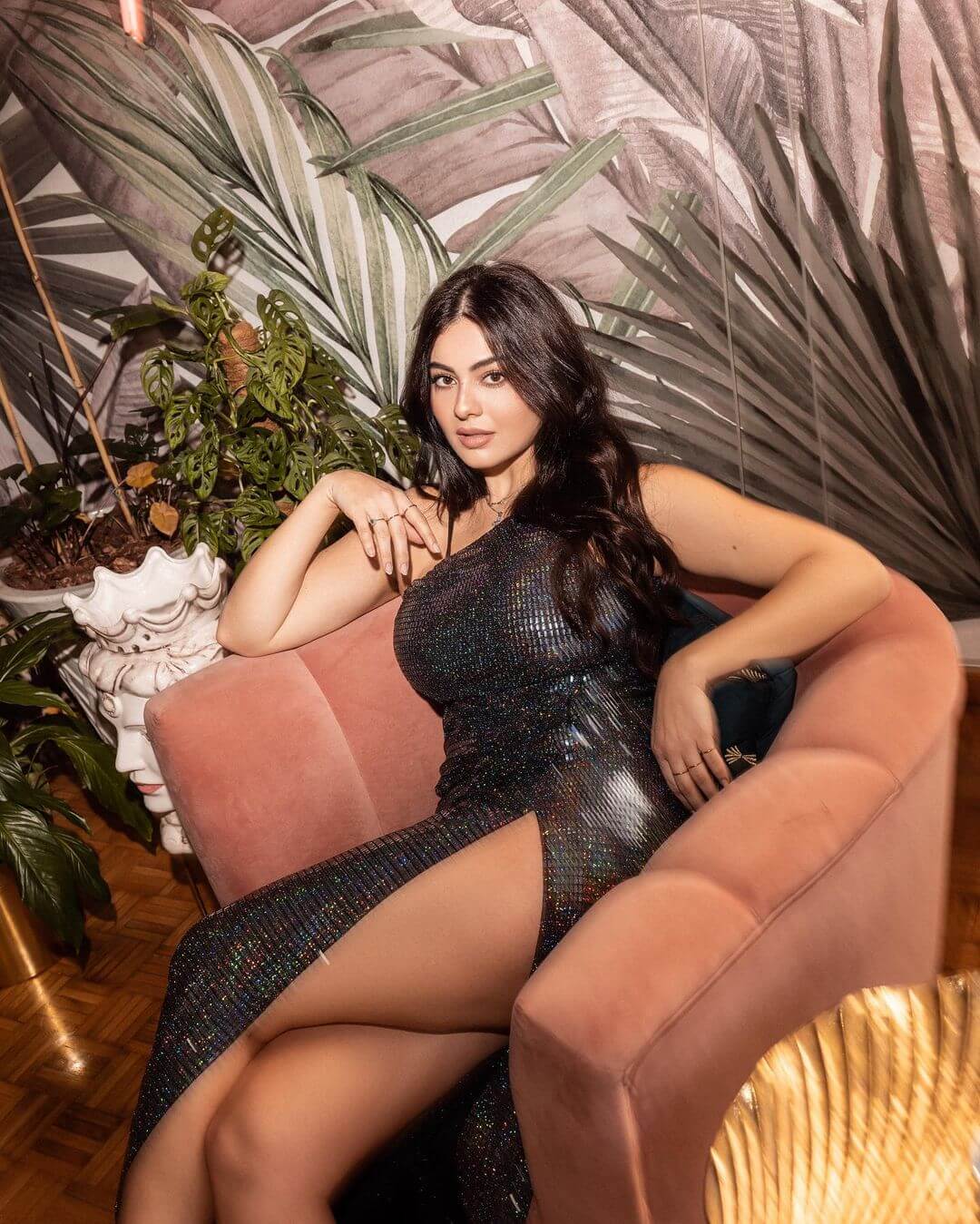 paola torrente sitting on couch