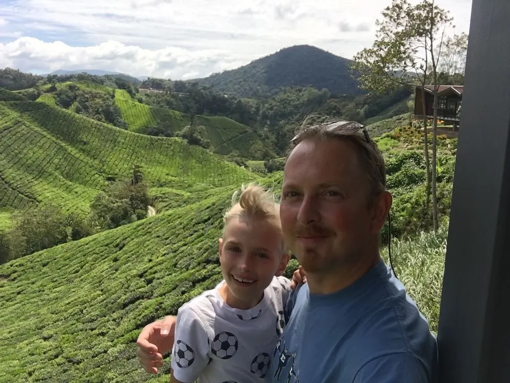 Łukasz taking selfie with his son. 