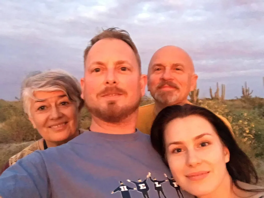 Łukasz with his family and girlfriend.