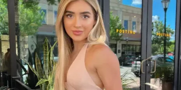 Faith Lianne posing in dress.