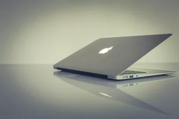 A MacBook on a table