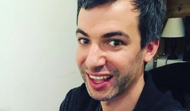 Nathan Fielder taking selfie.