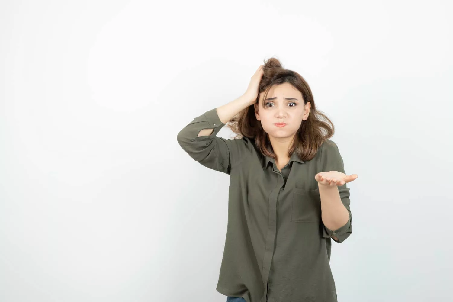 girl rubbing her hair