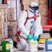 A man handling chemical and hazardous materials wearing safety suits.