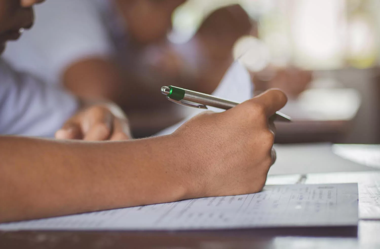 student giving exam