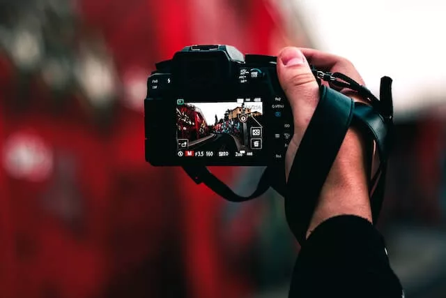 man holding camera