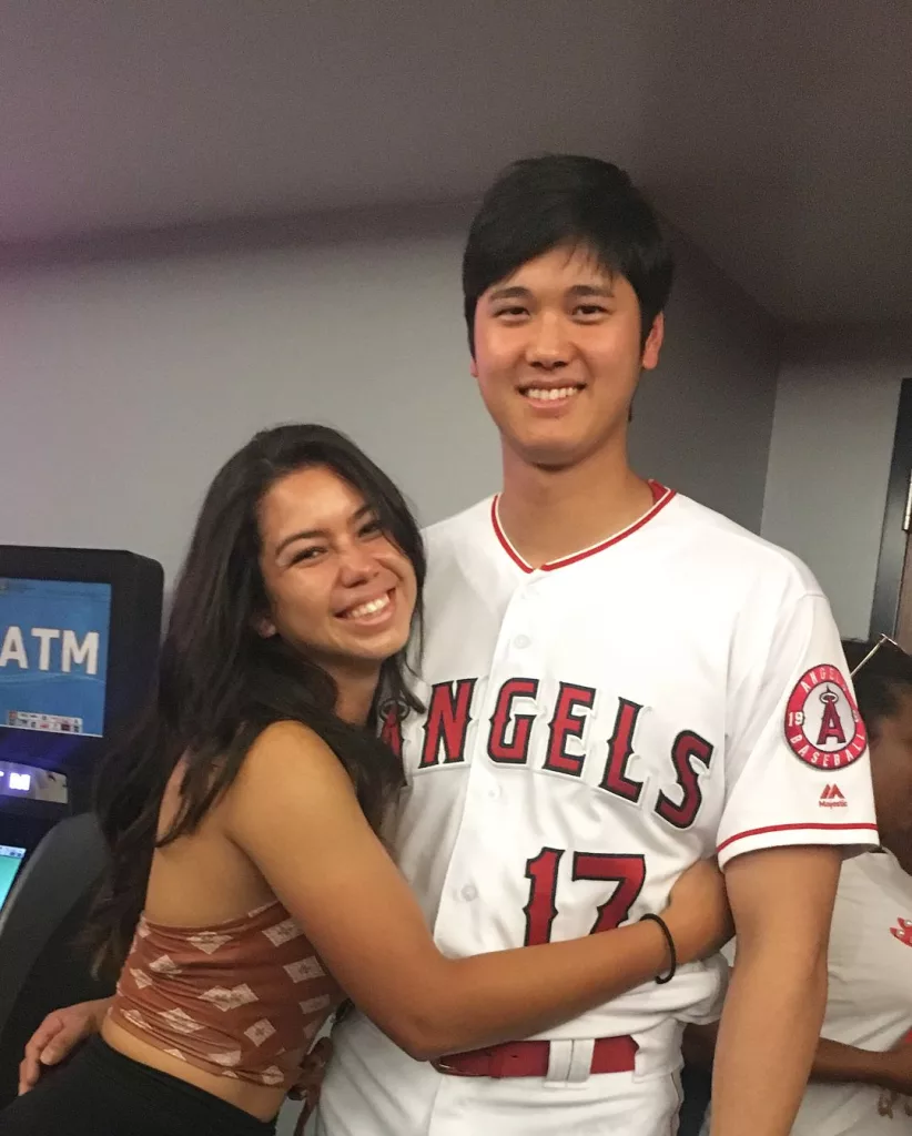 Kamalani Dung hugs Shohei Ohtani.