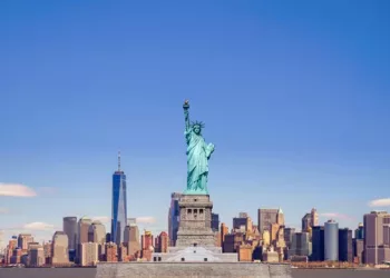 statue-liberty-with-one-world-trade-building-center-hudson-river-new-york-cityscape-background-landmarks-lower-manhattan-new-york-city