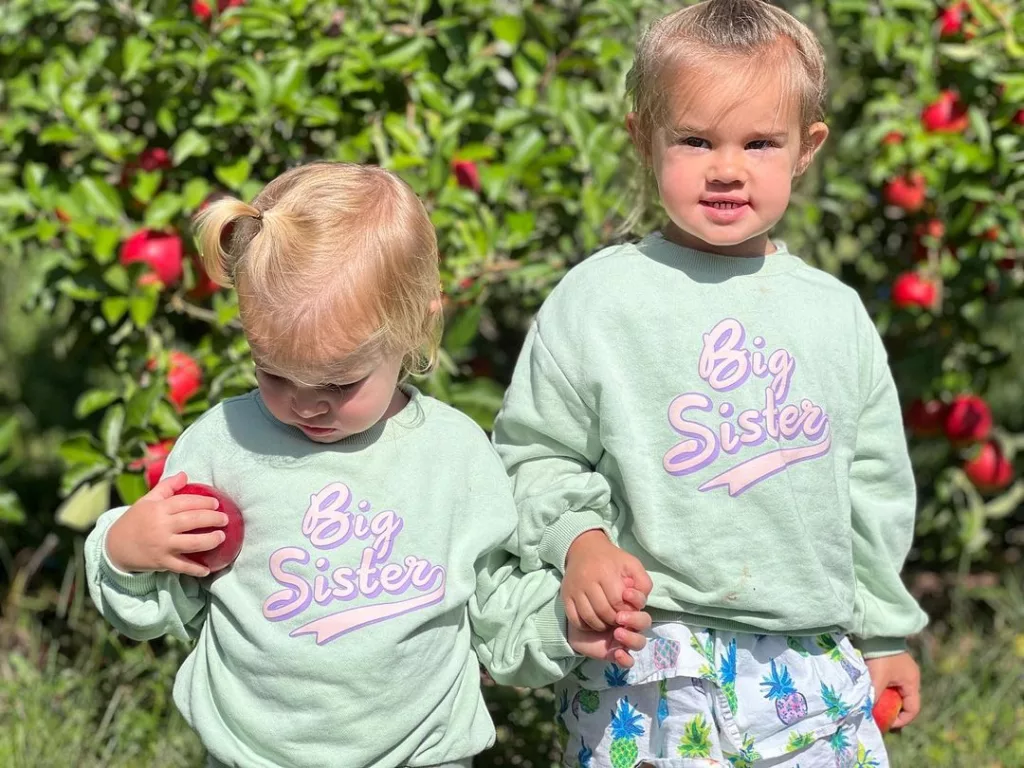 Wyatt and Eliotte wearing Big Sister Shirts.