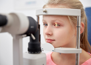 girl having eye check up