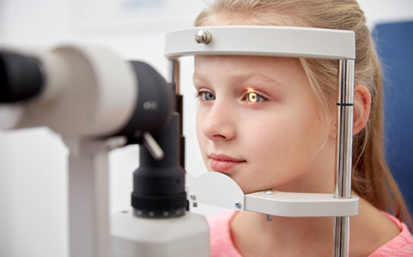 girl having eye check up