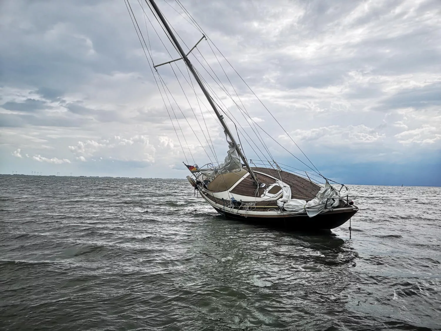 horizontal-shot-sailboat-sandbank-wangerooge-island-located-northern-germany
