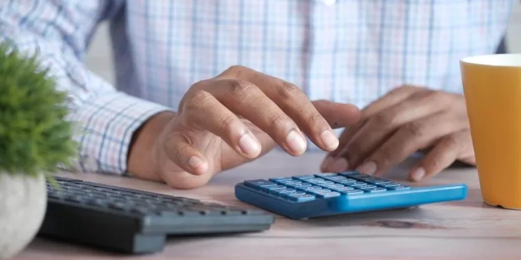 a man doing calculations